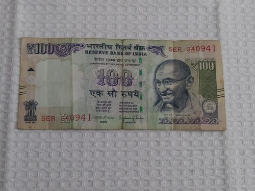 One hundred rupees - hundred, note